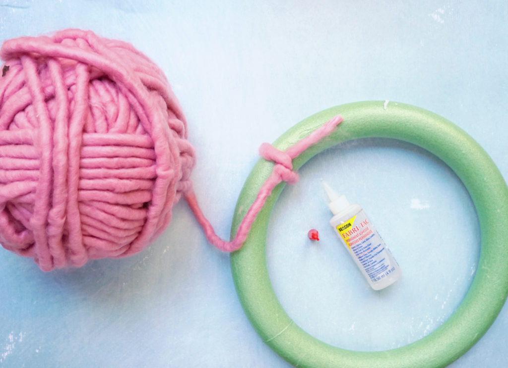 Making a yarn wreath in spring colors